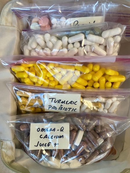 Vitamins and supplements with little labels tucked in the bags - Frances Schultz